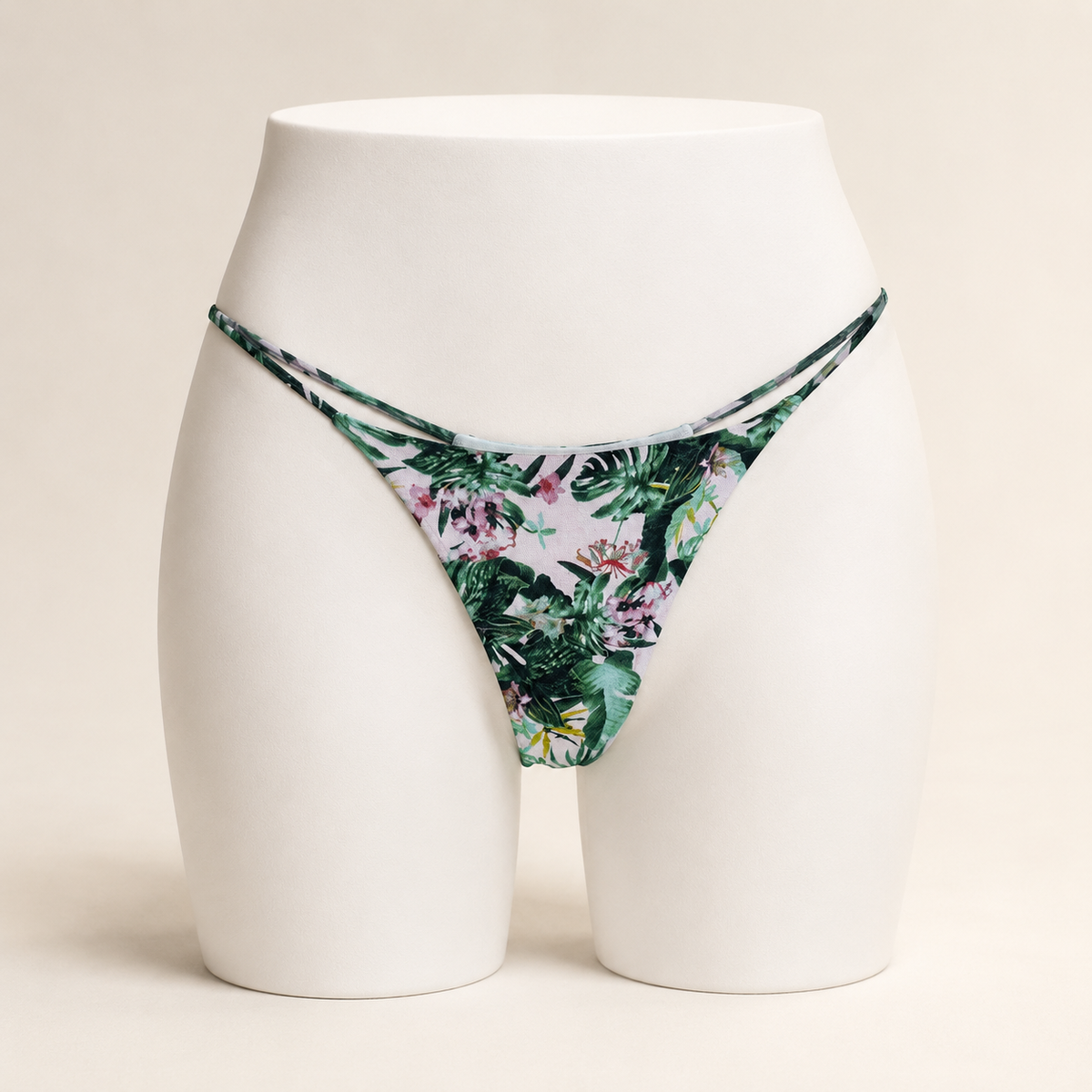 JIYUE botanical green floral cotton-knit low-rise thong on an AI-generated white apparel form