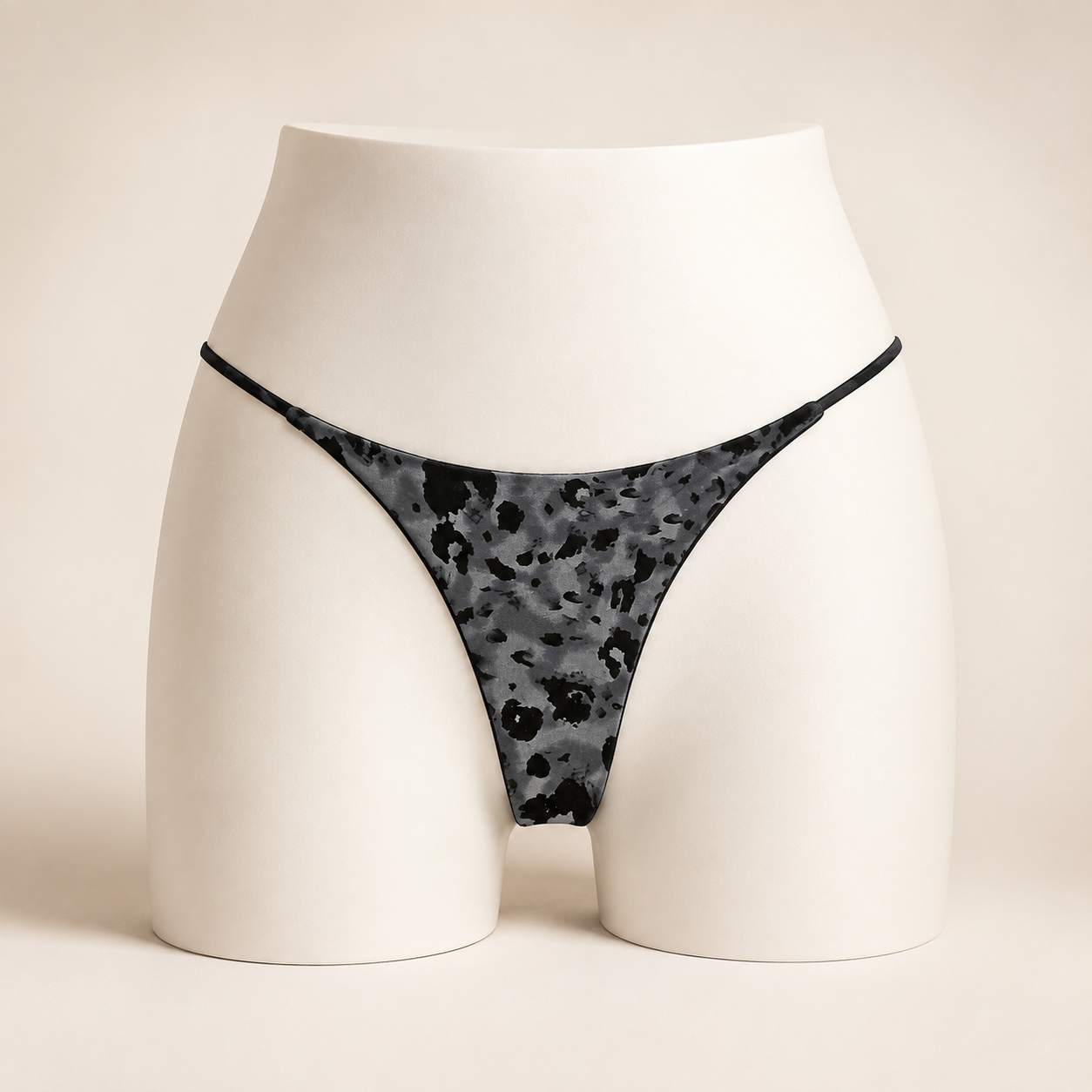 JIYUE grey leopard printed cotton-knit low-rise thong on an AI-generated white apparel form