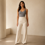 AI fashion model styling the JIYUE gray zip-front shaping bodysuit with cream trousers