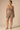 Original AI fashion model wearing JIYUE taupe seamless tummy-control shaping romper